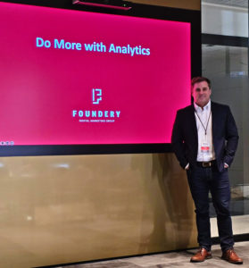 Foundery delivering a presentation about analytics strategy.